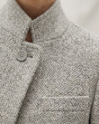 Light Grey Blazer, close-up of black accents, single-button closure and stand collar, by Floravincie