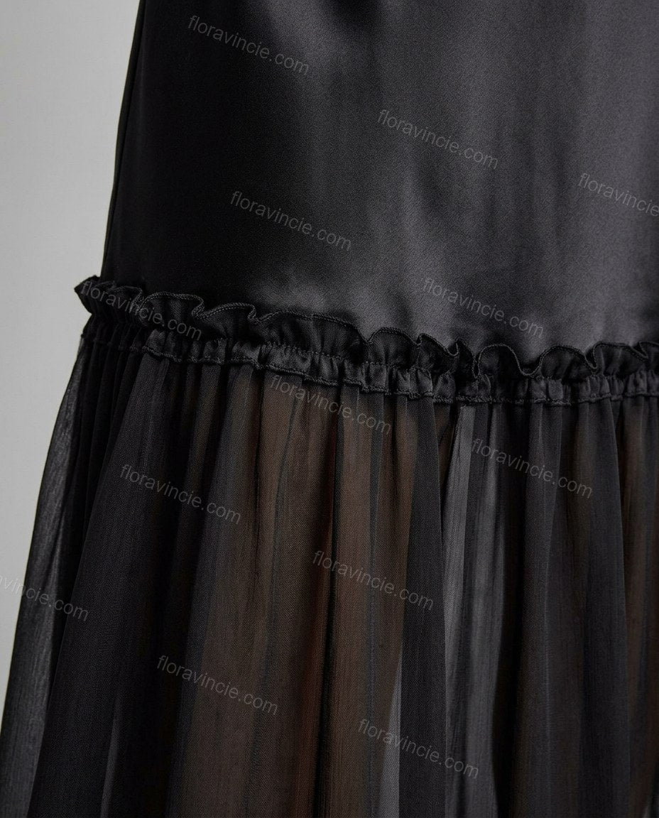 Black Maxi Ruffled Tiered Dress, close-up of sheer skirt overlay, tiered skirt and ruffled seam detail, by Floravincie