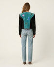 Light Blue Denim Pants, back studio view showing teal panel with celestial appliques, by Floravincie