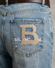 Brown Embroidered Denim Two-Piece Set, close-up of beige embroidery, belt loops and front pockets, by Floravincie