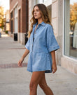 Light Blue Denim Jumpsuit, walking lifestyle view, by Floravincie