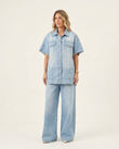 Light Blue Denim Jumpsuit, front studio view, by Floravincie