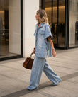 Light Blue Denim Jumpsuit, movement and fit lifestyle view, by Floravincie