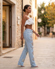 Light Blue Denim Pants, walking lifestyle view, by Floravincie