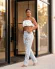 Light Blue Denim Pants, three-quarter brand lifestyle view, by Floravincie