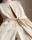 Cream Jumpsuit, close-up of mock neck, keyhole cutout and sleeveless, by Floravincie
