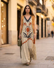 Beige Abstract Cape Tiered Bottom, movement and fit lifestyle view, by Floravincie