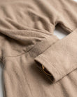 Tan Maxi Off-Shoulder Knit Dress, close-up of draped bodice, off-shoulder neckline and draped long sleeves, by Floravincie