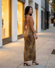 Brown Leopard Print Maxi Open-Back Dress, walking lifestyle view, by Floravincie