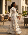 Off-white Geometric Maxi Dress, walking lifestyle view, by Floravincie