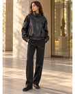 Black Asymmetric Jacket, movement and fit lifestyle view, by Floravincie