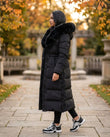 Black Faux-Fur Coat, walking lifestyle view, by Floravincie