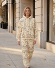 Cream Paisley Knit Ribbed Pants Set, walking lifestyle view, by Floravincie