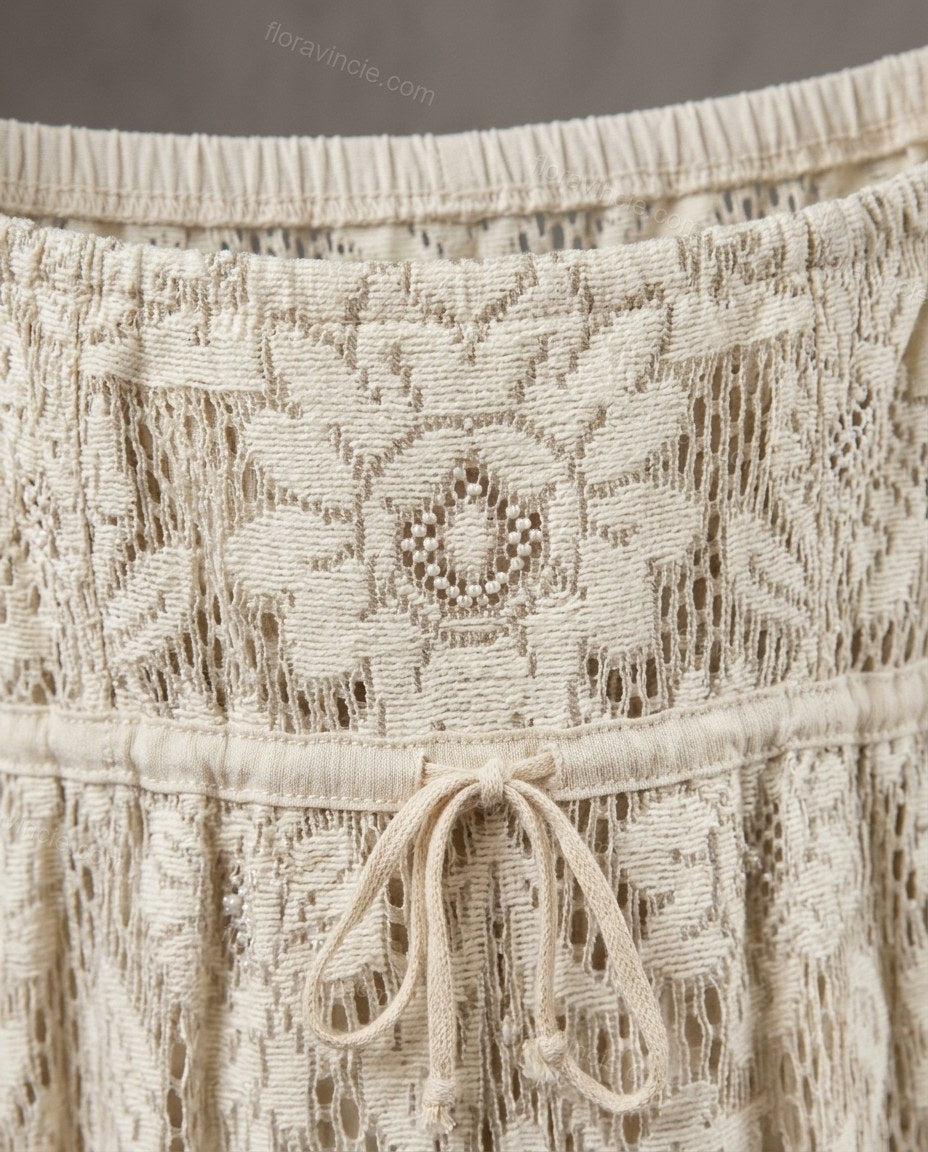 Ivory Floral Maxi Open-Back Dress, close-up of floral embroidery and scalloped hem, by Floravincie