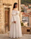 White Maxi Off-Shoulder Dress, three-quarter brand lifestyle view, by Floravincie