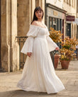 White Maxi Off-Shoulder Dress, walking lifestyle view, by Floravincie