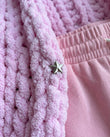 Pink Knit Ribbed Two-Piece Set, close-up of hood, snap button front closure and dropped shoulders, by Floravincie
