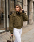 Olive Green Ribbed Jacket, walking lifestyle view, by Floravincie