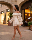 Off-white Mini Off-Shoulder Ruffled Dress, walking lifestyle view, by Floravincie